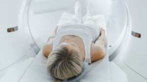 woman going through a scan. 